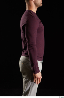 Anatoly  1 arm dressed flexing side view sweatshirt 0001.jpg